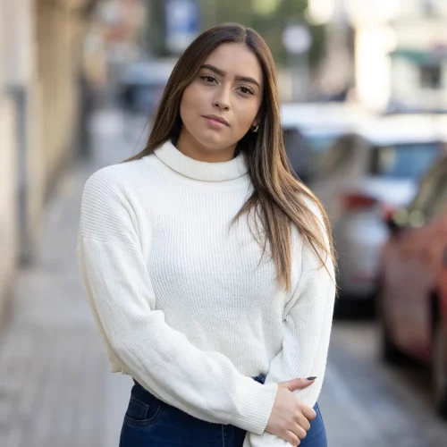 Woman standing outside on the way to her pregnancy testing appointment in Grand Rapids, MI.